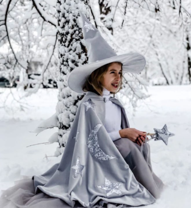 Girl wearing a snow wizard costume
