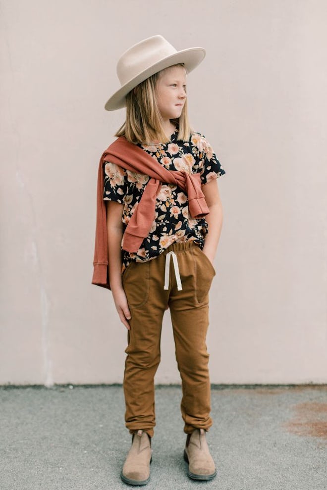 Kid posing, modeling tee shirt
