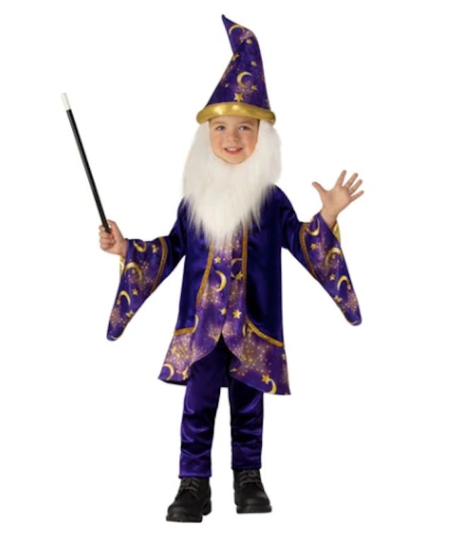 Toddler wearing a wizard costume