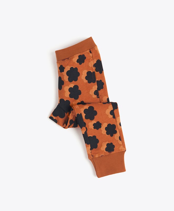 Flay lay of kids joggers in leopard print pattern