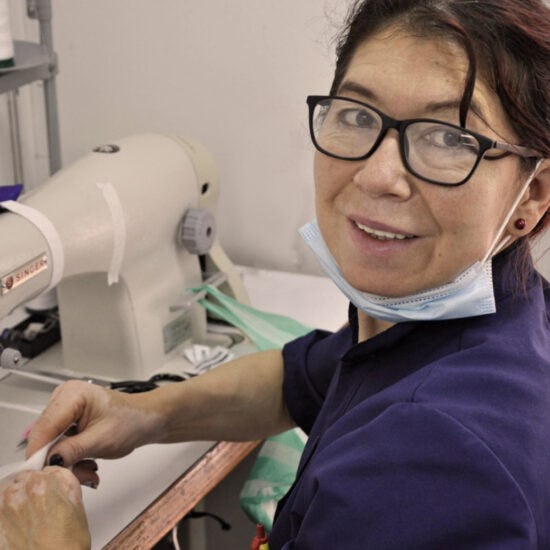 One of Dauntless' employees sewing products in Bogota, Colombia