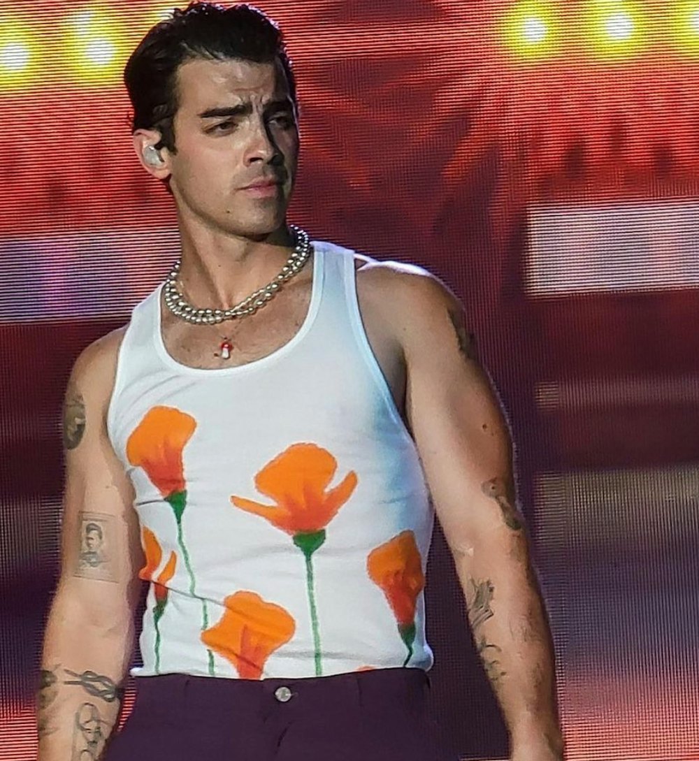 Joe Jonas wearing the Birthday Girl Shop Poppy tank