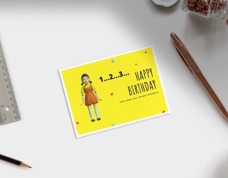 This robot doll card is one of many instant download 'Squid Game' birthday cards on Etsy. 
