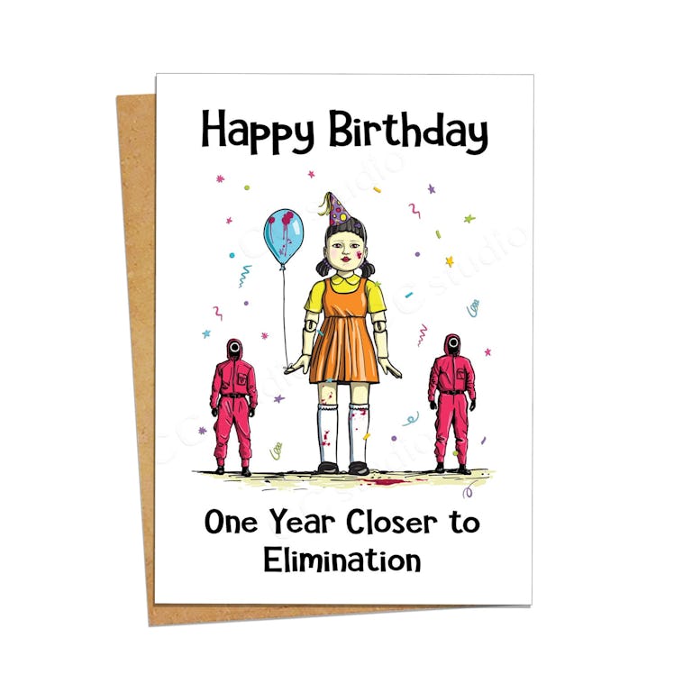 This doll and guard card is part of the many 'Squid Game' birthday cards on Etsy. 