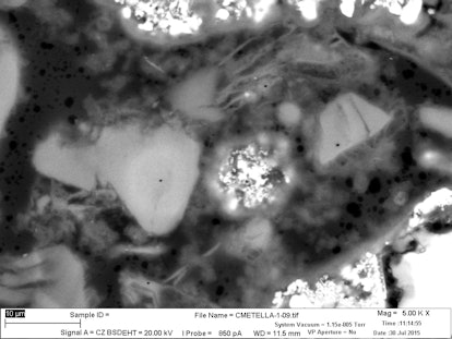Scanning electron microscope image of the tomb mortar. The intact and wispy C-A-S-H  features appear...