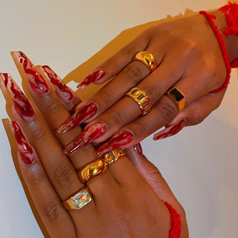Megan Thee Stallion's Halloween nail art designs have already been declared the winner of the 2021 s...