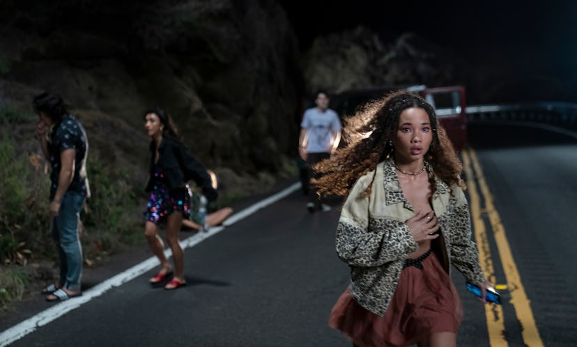 Ashley Moore as Riley searching for the body following the group's car accident in 'I Know What You ...