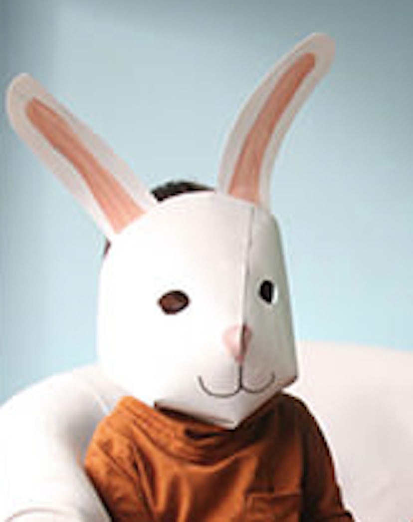 Child wearing handmade bunny mask