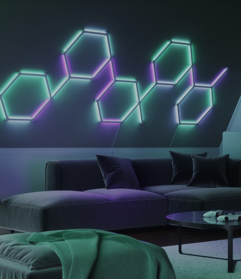 Nanoleaf Lines installed on a wall above a sofa.