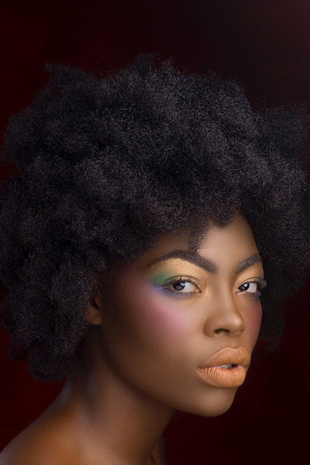Woman with rainbow colored makeup