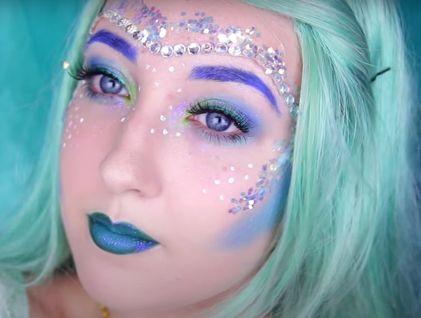Woman modeling mermaid makeup