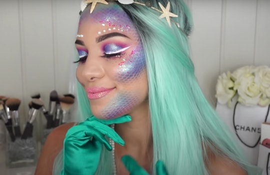 Profile of a woman modeling mermaid makeup