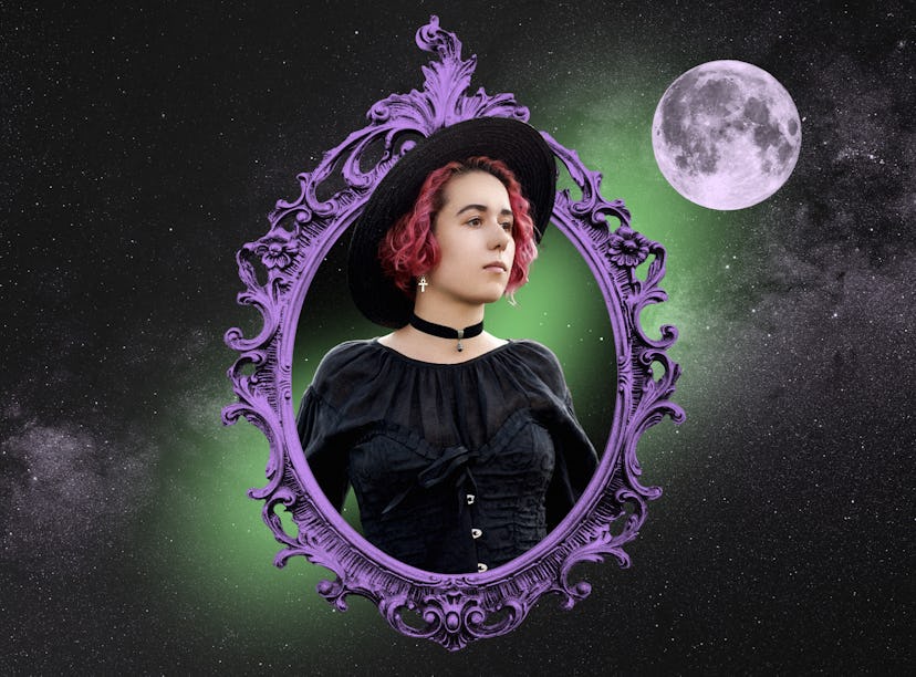 Young woman in costume reading her Halloween 2021 horoscope.