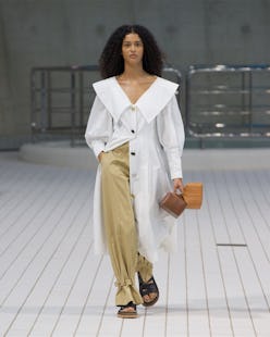 runway model carrying bags