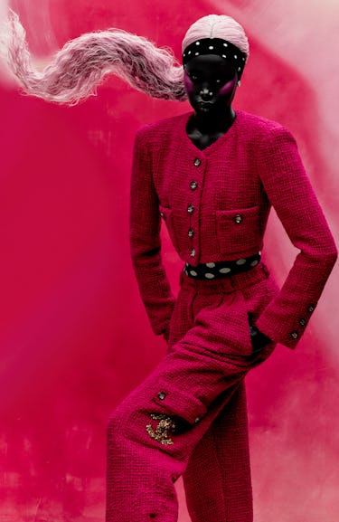 Priscilla wears a Chanel jacket and pants; Van Cleef & Arpels earrings; headband and tights from Ib ...