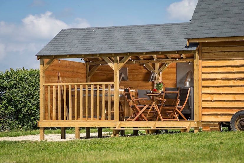 A wooden countryside cabin with a closed patio section in Mickleton, Gloucestershire