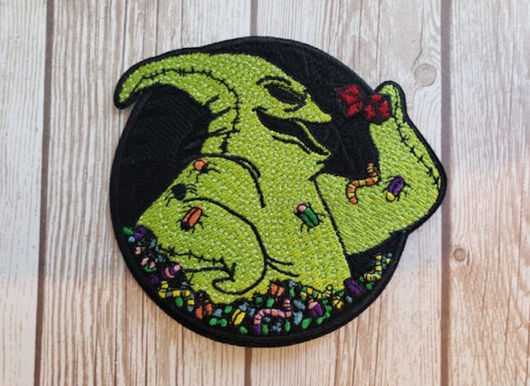 These cheugy Halloween trends include iron-on patches like Oogie Boogie.