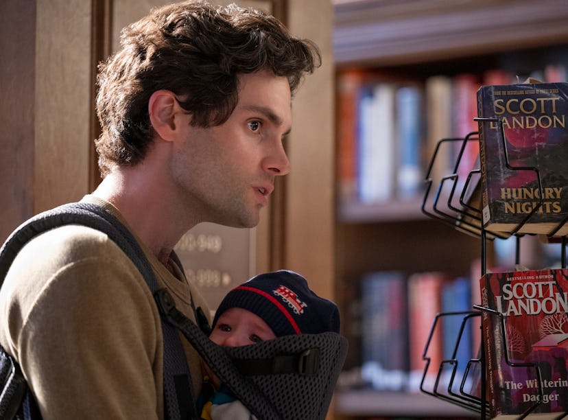 PENN BADGLEY as JOE GOLDBERG with baby in Season 3 of Netflix's 'You'