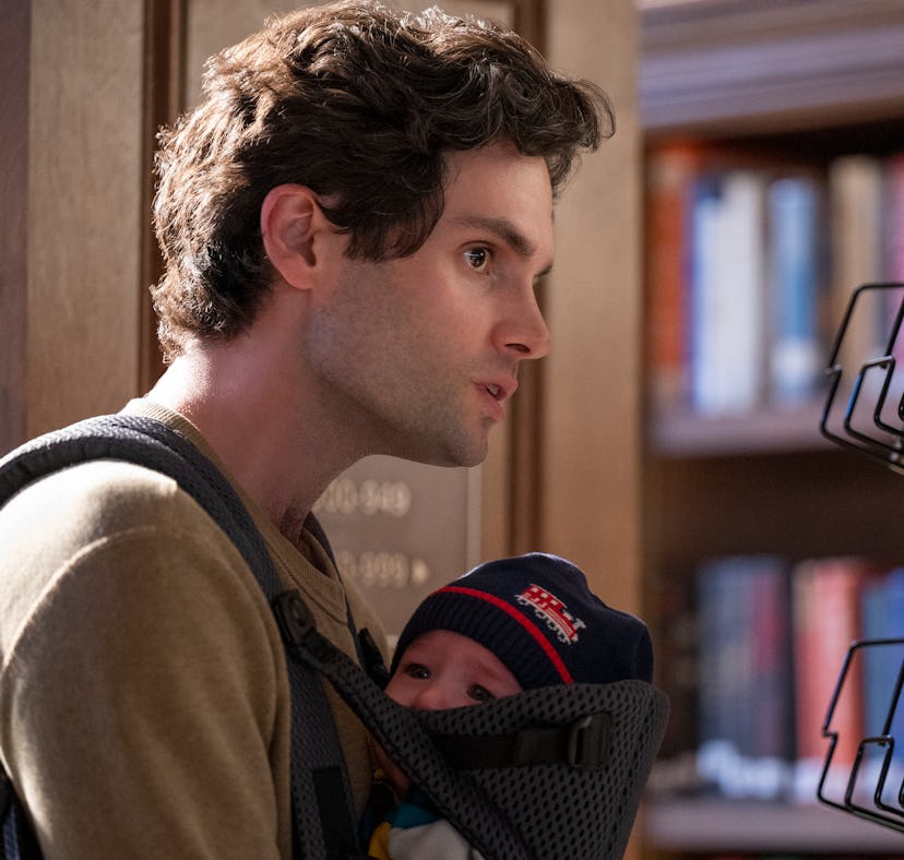 PENN BADGLEY as JOE GOLDBERG with baby in Season 3 of Netflix's 'You'
