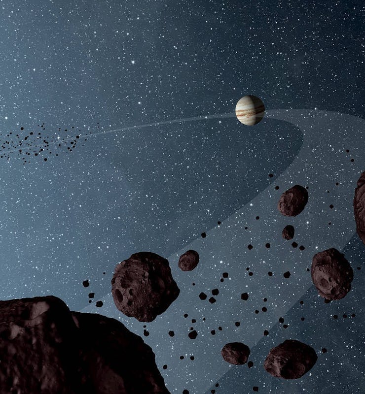 An illustration of the Trojan asteroids and Jupiter