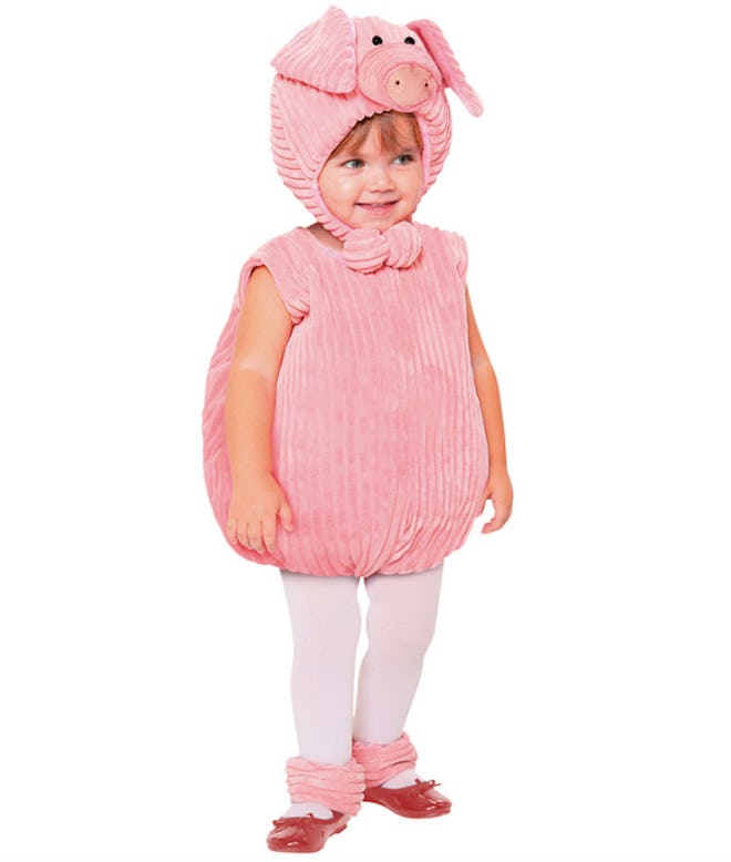 Pink pig costume on toddler
