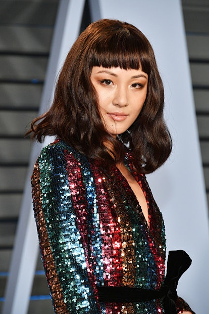 Constance Wu shows off her bob haircut with baby bangs.