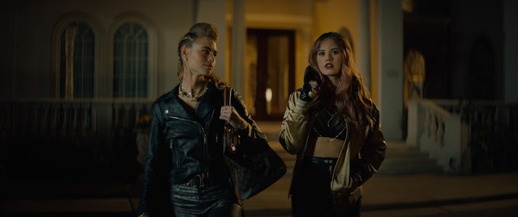 Lucy Fry as Zoe, Debby Ryan as Blaire in Netflix's 'Night Teeth'