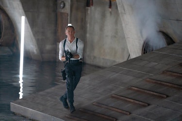 James Bond with a gun in some underground water tunnels