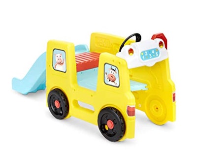 Image of a toddler-size climb-on toy bus with attached slide.