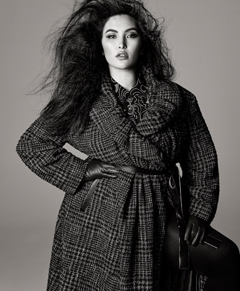 Model wears a plaid coat from Zara’s Fall/Winter 2021 Studio collection.