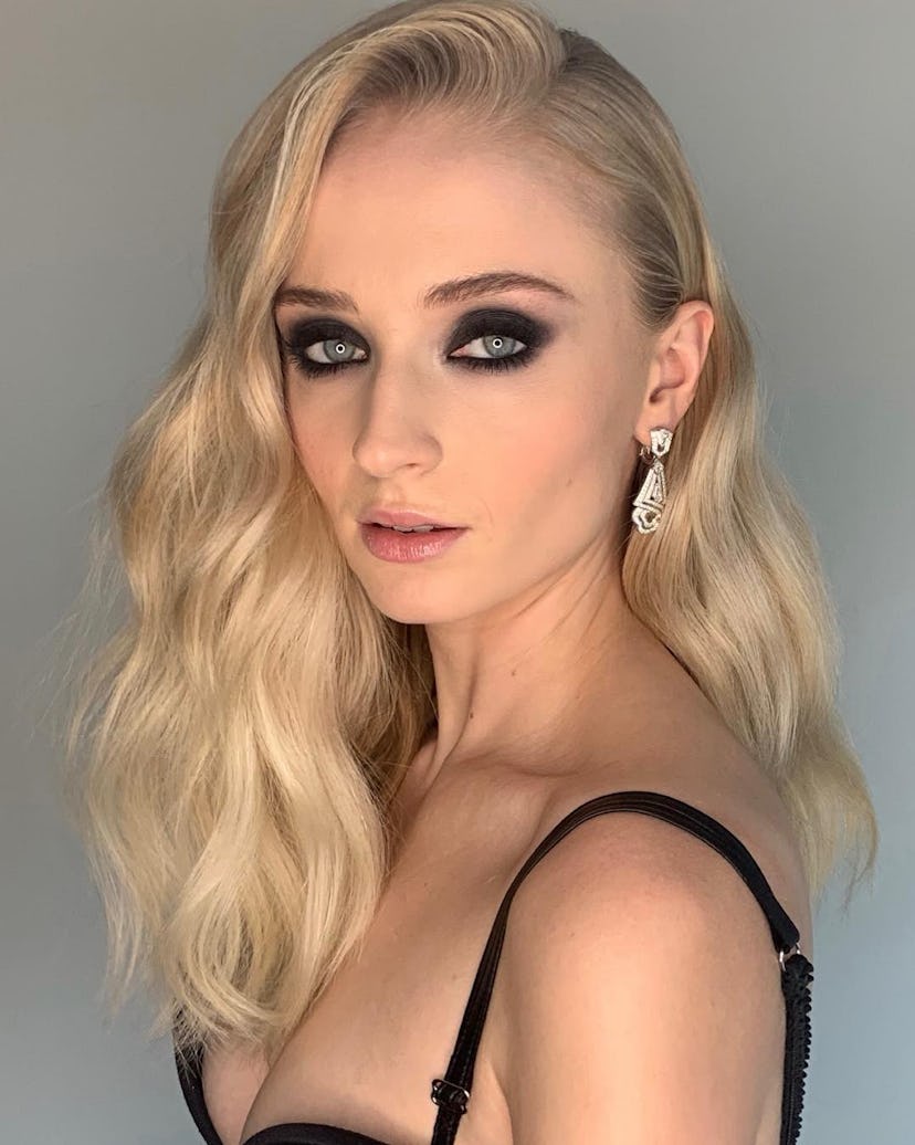 Blonde sophie turner with smoky black eyeshadow