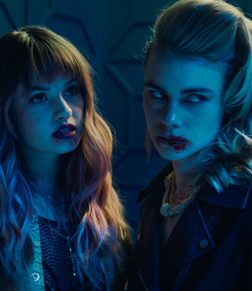 Debby Ryan as Blaire and Lucy Fry as Zoe in Netflix's 'Night Teeth'