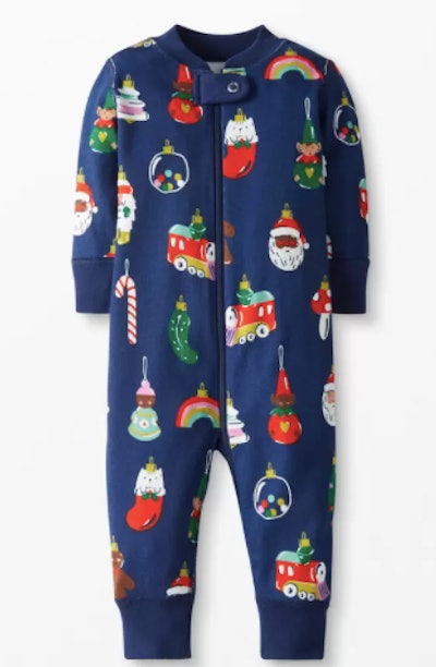 Baby onesie sleeper covered in Christmas ornaments