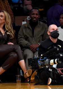 Singer Adele and Rich Paul attend a game between the Los Angeles Lakers and the Golden State Warrior...