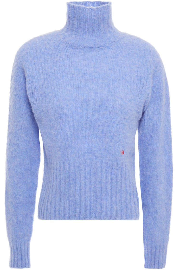 Victoria Beckham's light blue wool turtleneck sweater. 