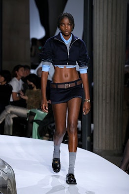 A model walks the runway during the Miu Miu Womenswear Spring/Summer 2022 show 