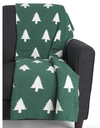 Blanket covered in pine tree designs