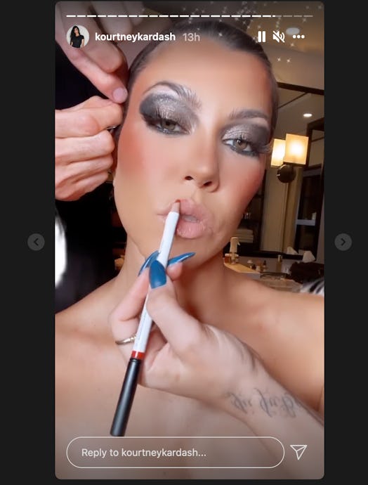 Kourtney Kardashian getting makeup done