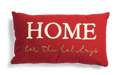 Pillow that says home for the holidays