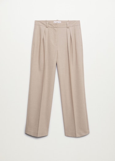 Beige pleated suit pants from Mango.