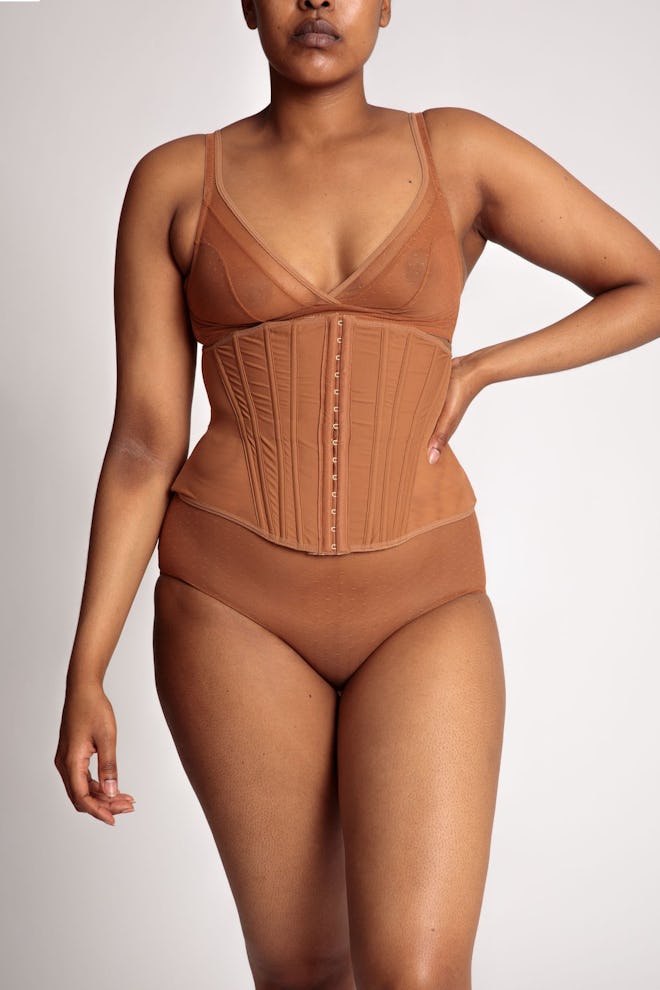 The Parris Corset in Caramel from Nubian Skin.