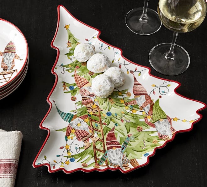 This Forest Gnome Christmas Tree Shaped Stoneware Serving Platter is available from Pottery Barn.