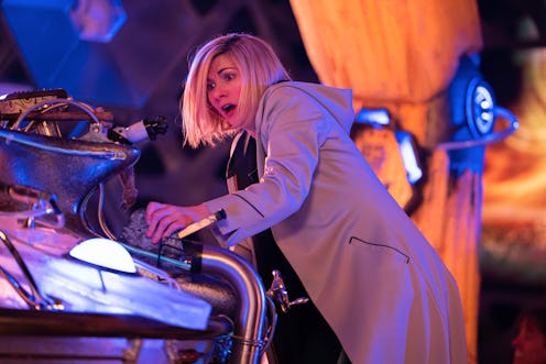 The Doctor (played by JODIE WHITTAKER) looking concerned over the Tardis controls in a scene from BB...