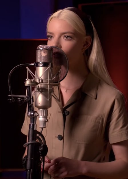 Anya Taylor-Joy in a beige shirt in a studio recording the song Downtown for the movie Last Night in...