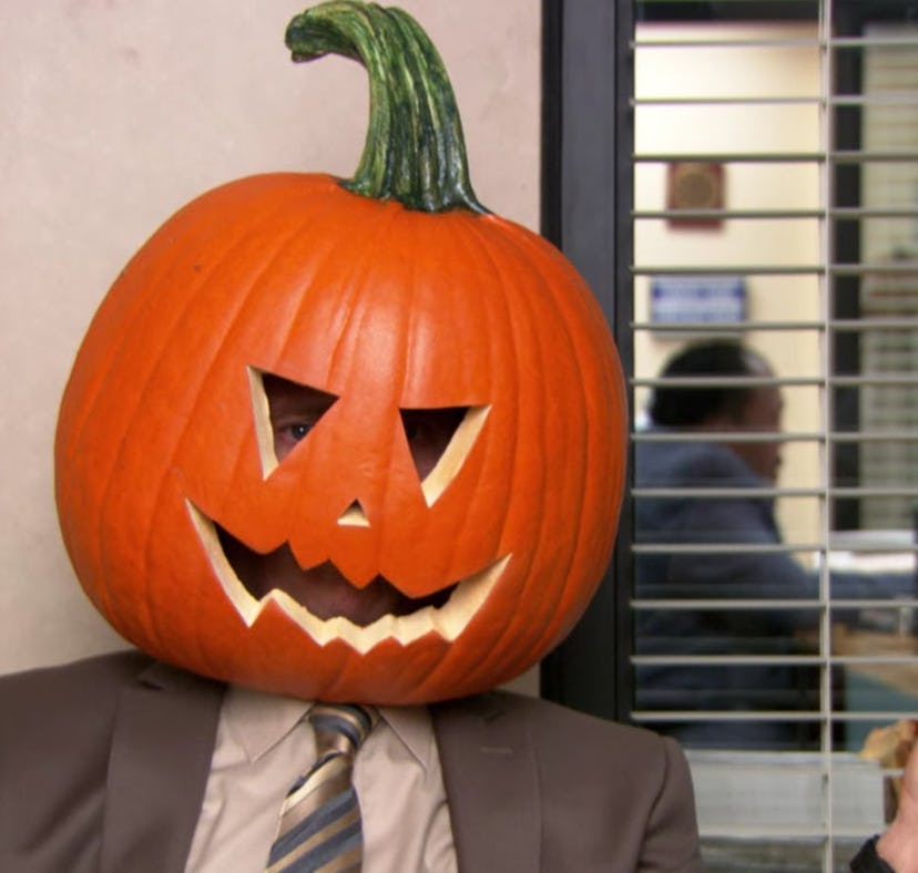 Dwight Schrute talks to the camera with a pumpkin on his head, creating an iconic caption from 'The ...