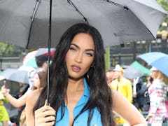 Megan Fox in an all-blue outfit before solidifying herself as an intermediate astrologer with a stri...