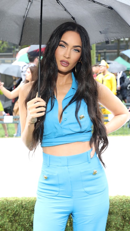Megan Fox in an all-blue outfit before solidifying herself as an intermediate astrologer with a stri...