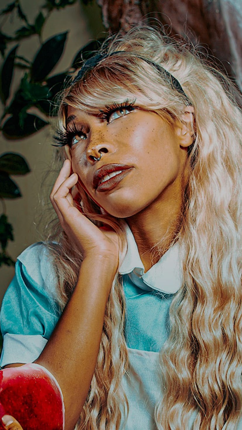 Black cosplayer Kiera Please dressed as Alice in Wonderland