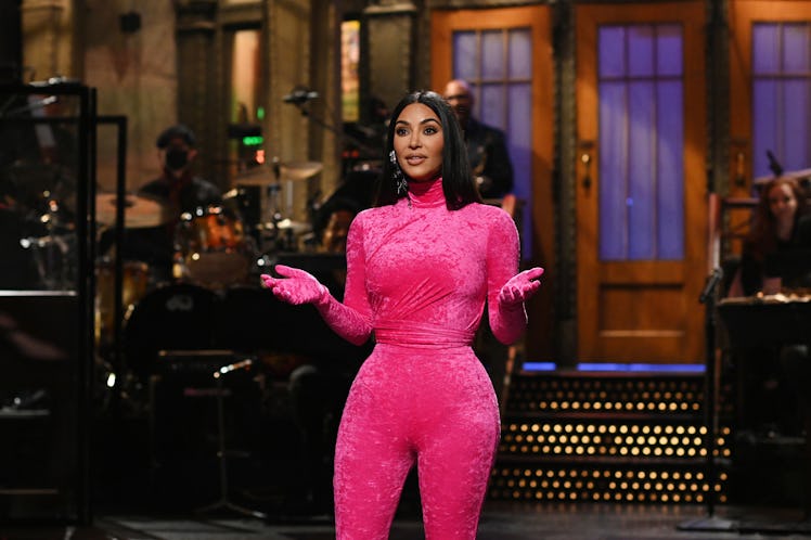 Kim Kardashian West hosting SNL in a pink velvet jumpsuit 