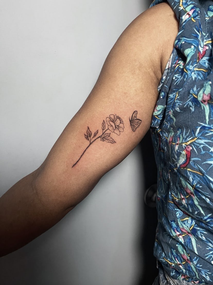 A floral fine line tattoo is always a classic way to go.